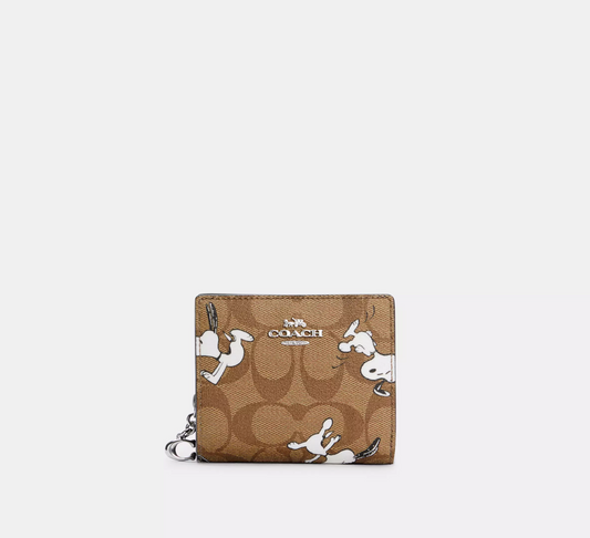 C.O.A.C.H X Peanuts Snap Wallet In Signature Canvas With Snoopy Print