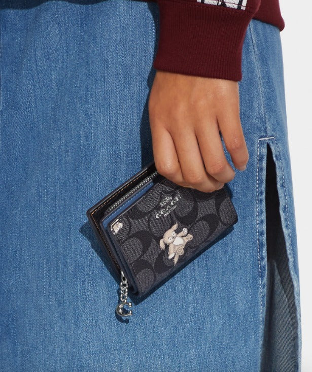 C.O.A.C.H Snap Wallet In Signature Canvas With Happy Dog Print Zipper